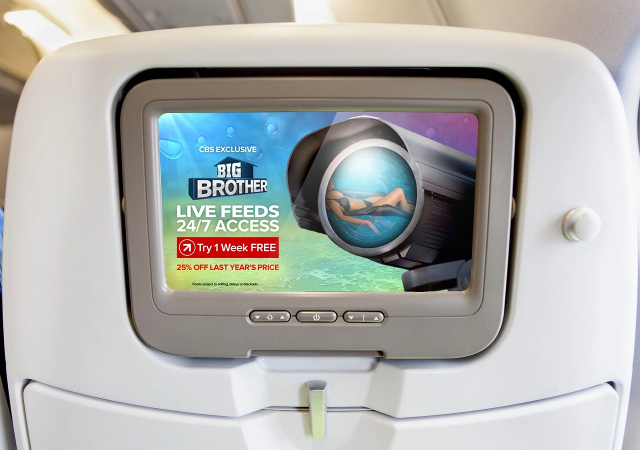 CBS All Access Big Brother Live Feeds promotion on an in-flight entertainment screen